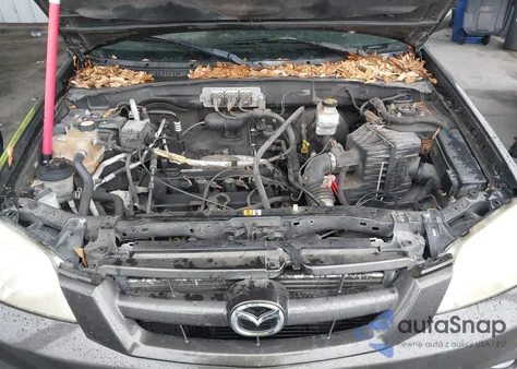 2006 Mazda Tribute I z USA, uszkodzony, nr VIN 4F2YZ02Z56KM2467